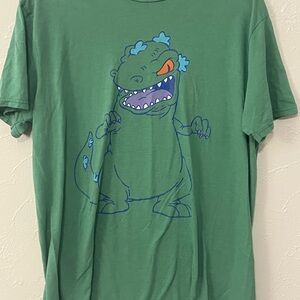 Rugrats Reptar graphic t-shirt.